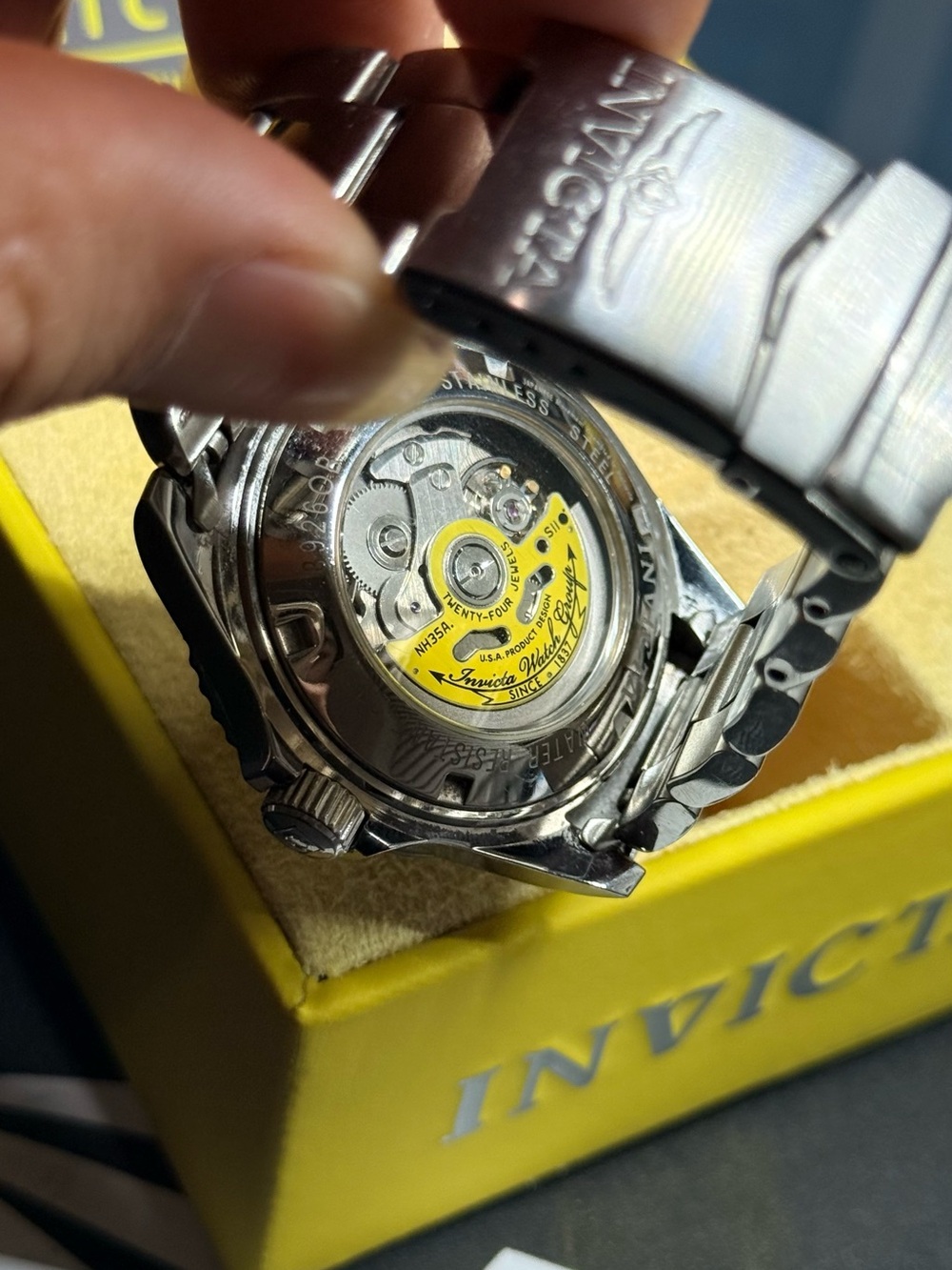 Invicta Men's Silver Stainless Steel Watch with Yellow Rotor Accent